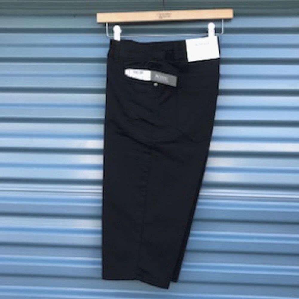 Bermuda Shorts . Size: 4 Petite Skimmer . Casual or Dress . Black . New w/ Tags